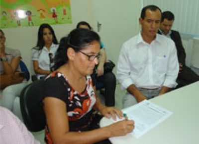 Padrinhos assinam Termo de Compromisso